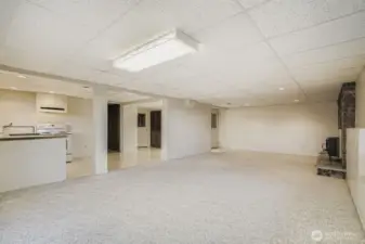 Another view of the lower level family room plus dinging area off 2nd kitchen.