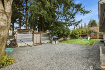 Gravel area great for extended patio space, fire pit, so many possibilities ~