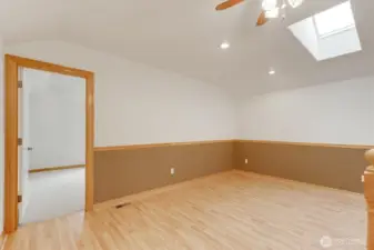 Upstairs family Room with 2 bedrooms and Bathroom nearby