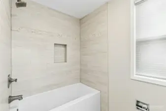 Primary bath tub and shower.