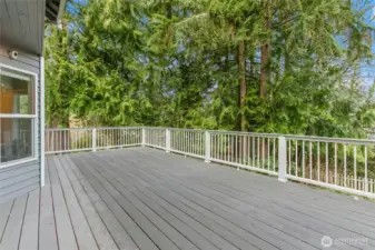 Enjoy morning coffee or a meal on the large Trex deck.