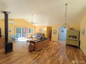 Lovely acacia hardwood floors. The great room has space for the dining area.