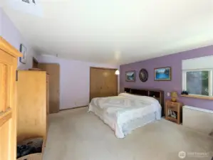 Primary bedroom with large closet.