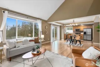 Living room looking into dining room and kitchen.