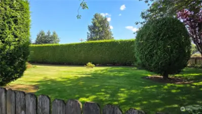 Mature landscaping, fenced backyard