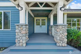 Stunning entry with covered porch.