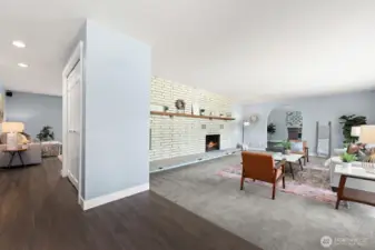 Entry with formal living room to the right and family room ahead.