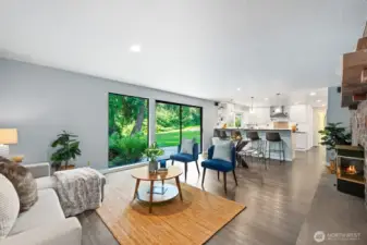 Family room opens to the kitchen with sliding glass door to the private back yard.