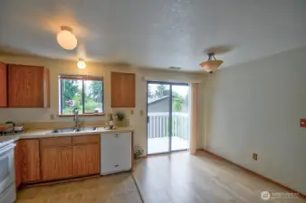 Glass slider leading to side deck.