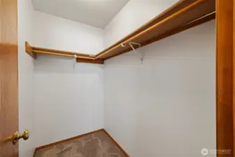 The walk in closet in the primary bedroom.
