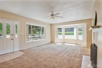 Spacious living room with tons of natural light overlooking Vandercook Park
