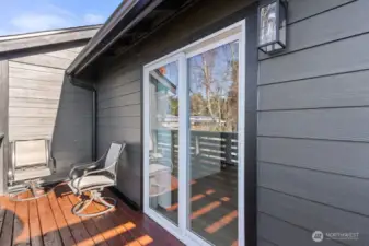 Second private bedroom offers direct access to a balcony, perfect for relaxing or enjoying the view.