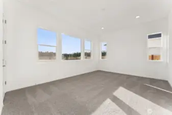 Actual Home   Primary Bedroom with door leading to covered patio