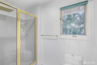The primary suite also includes a separate shower and private water closet, designed to enhance convenience and privacy.