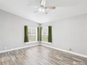 Light and bright oversized primary room.