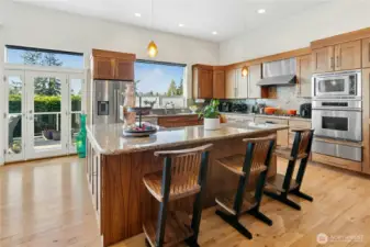 Large kitchen with island and seating.