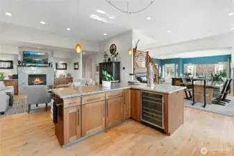 Wine fridge, pullouts, maple cabinets, and tons of storage.