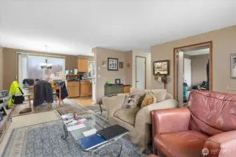 Living Room Opens to Dining Room & Kitchen. Slider to the Backyard.