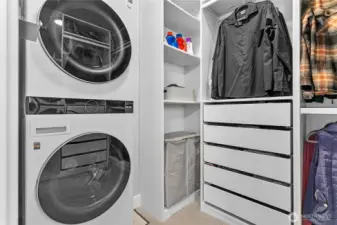 Main floor laundry off primary bedroom ensuite