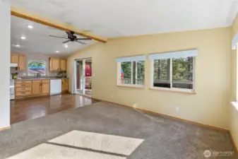 Open concept, vaulted living room, open to the kitchen