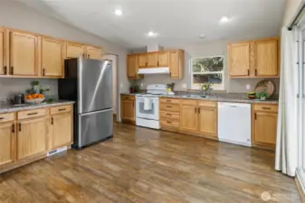 The kitchen is a delight...solid oak cabinets, beautiful black accent handles, just what a cabin in the woods should be - and if you like to cook, this is will be your happy place!