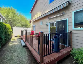 Private back deck with awning for shade and heaters for the winter