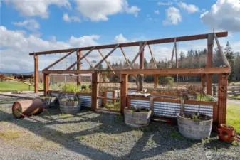 fully enclosed garden space with attached playset!