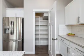 Walkin pantry with built-in custom storage