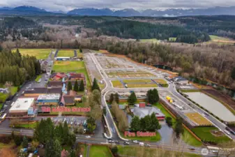 A new 141 home community being built 1/2 mile south of subject property. $1M+ homes will create demand for new services & businesses in town.