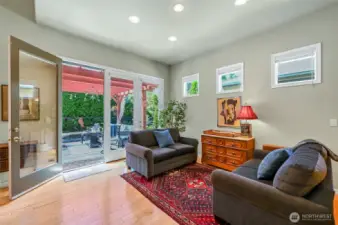 A great spot to visit with friends over a cup of coffee or glass of wine . . . it opens out to the upper covered patio.