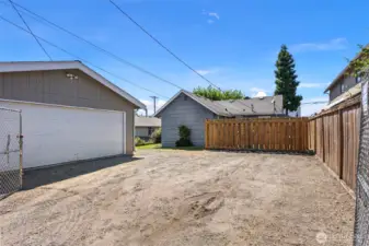 Ample parking options with the 2-car detached garage & uncovered gravel parking in the front and back.