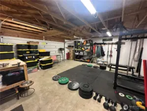 Lots of space inside the 2-car garage for vehicles, storage and even your own gym!
