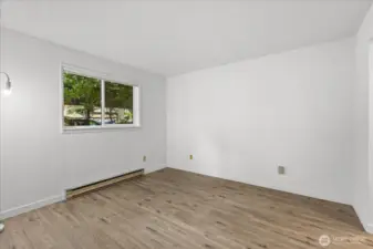 Primary bedroom with area to primary closet and bath to the right.
