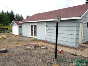 Converted 2 car garage is now set up for grooming and litter tending. It's heated and houses water filtration system.