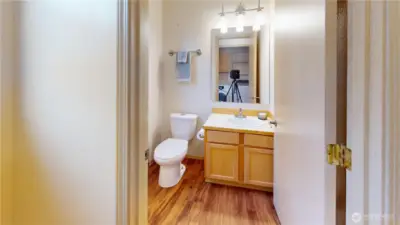 This floor plan has a large !/2 bath off the main floor for guests to use.  The home offers a primary suite on the main floor with an ensuite 5 piece bath and a guest suite or 2nd  bedroom on the second floor with a full bath as well!