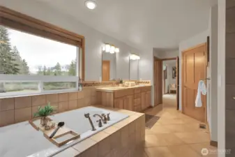 A soothing bathroom escape with a jetted tub for your own spa moment at home.