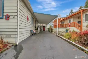 Covered parking along driveway