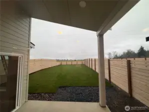 Backyard covered patio & fully fenced