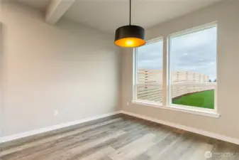 Kitchen dining area flooding with natural light