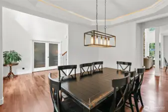 Staged formal dinning room, large table friendly.