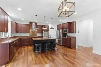 Luxury kitchen, rare red dragon granite throughout, soft close throughout, walk in pantry, shaker style cabinets with dove tail face.