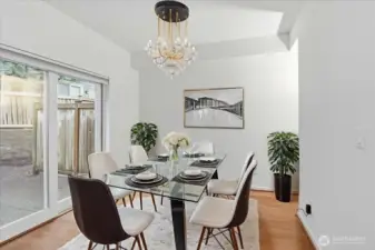 Dining Area (Virtually Staged) with walk-out private patio.