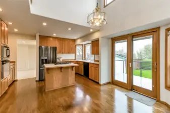 Kitchen is centrally located off the dining room, informal eating area and outdoor deck