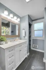 Fully updated bathroom boasting ample storage and modern finishes!