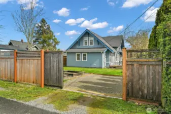 Gate off the alley for secure parking.