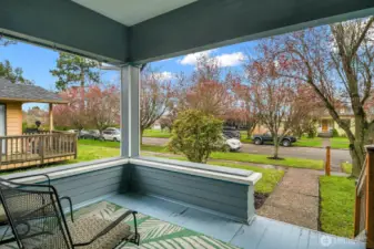 Charming covered front porch—an ideal spot to relax and greet neighbors in style.