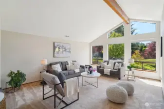 Vaulted Ceilings and Cathedral Windows grace the Large Sunken Living Room