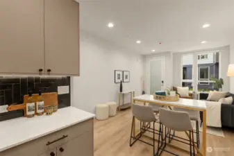 Photos of model home with similar finishes & floor plan. Whether it's a casual meal or a gathering with friends, this layout adapts to your lifestyle.