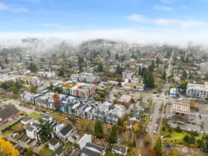 Aerial views show the model home in its prime Whittier Heights location, surrounded by local shops, parks, and vibrant neighborhood attractions.
