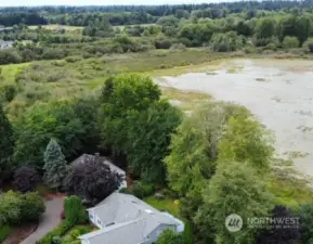 Aerial views of home with newer 50 year roof.